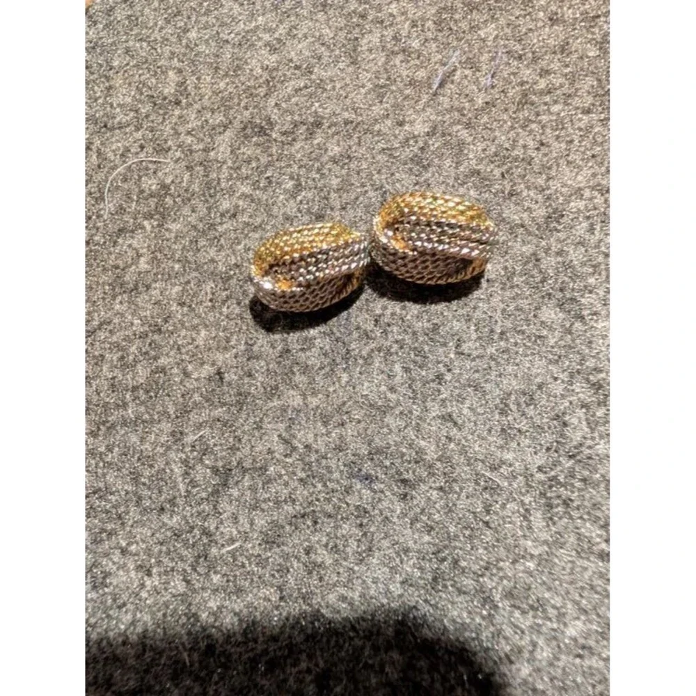 Gold and silver diamond cut earrings
